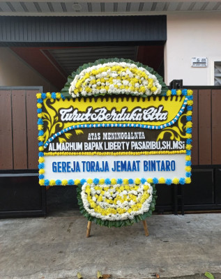 Papan Bunga Duka di Baamang